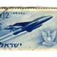 Illustration for article titled Beautiful postage stamps from the Mad Men era celebrate spaceships and progress
